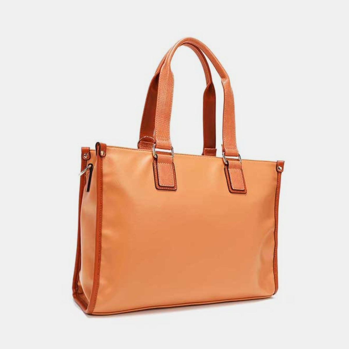 The Nicole Lee USA Large Messenger Bag, made from orange vegan leather, features two front pockets, gold buckles, a top zipper, and dual handles. Set against a white background, this stylish bag provides plenty of storage space for all your essentials.