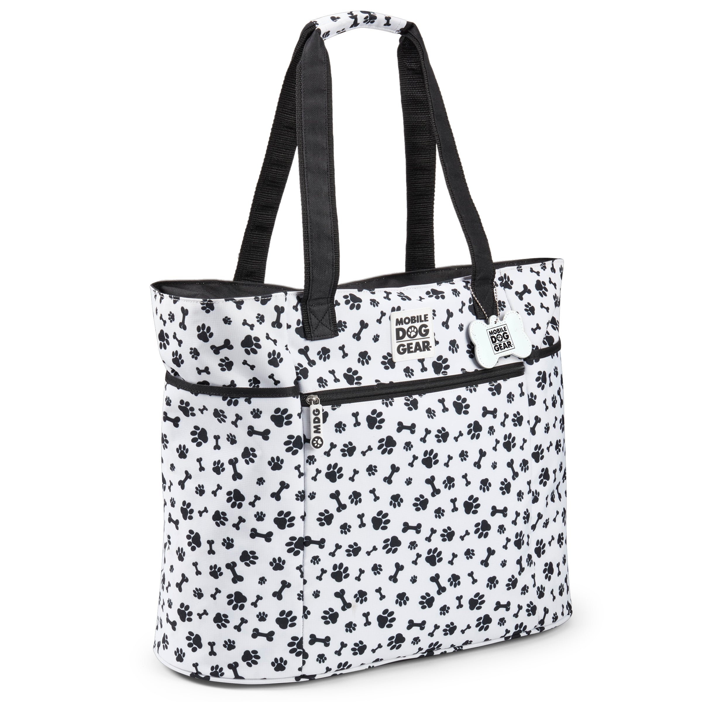 The Mobile Dog Gear Dogssentials Tote Bag features a paw print design, clear pouch, and small accessory bag. Speech bubbles display a dog declaring, "This is MY Bag!" alongside a person exclaiming, "And Mine!" Ideal for stylishly transporting all your dog's essentials.