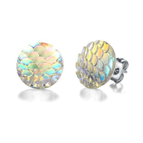 The Mermaid Stud Earrings feature two iridescent zinc alloy studs: one flat with a scale pattern and the other textured, elegantly displayed against a white background.