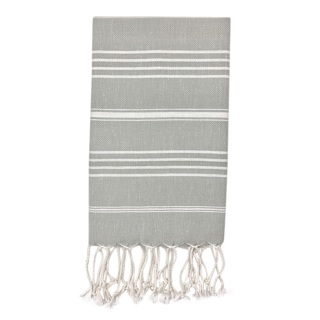 The Classic Turkish Hand Towels in five elegant striped designs, featuring shades of blue, brown, beige, navy, and grey, are beautifully displayed. Made from 100% Turkish cotton and adorned with white fringe on one end, they offer exceptional absorbency for all your needs.