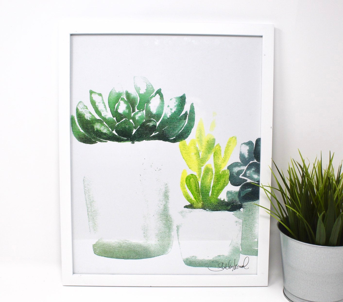 The Succulent Art Print (4) on 11x14 paper features a botanical art piece displaying three watercolor succulents in white pots against a light background, perfect for wall art and home decor.