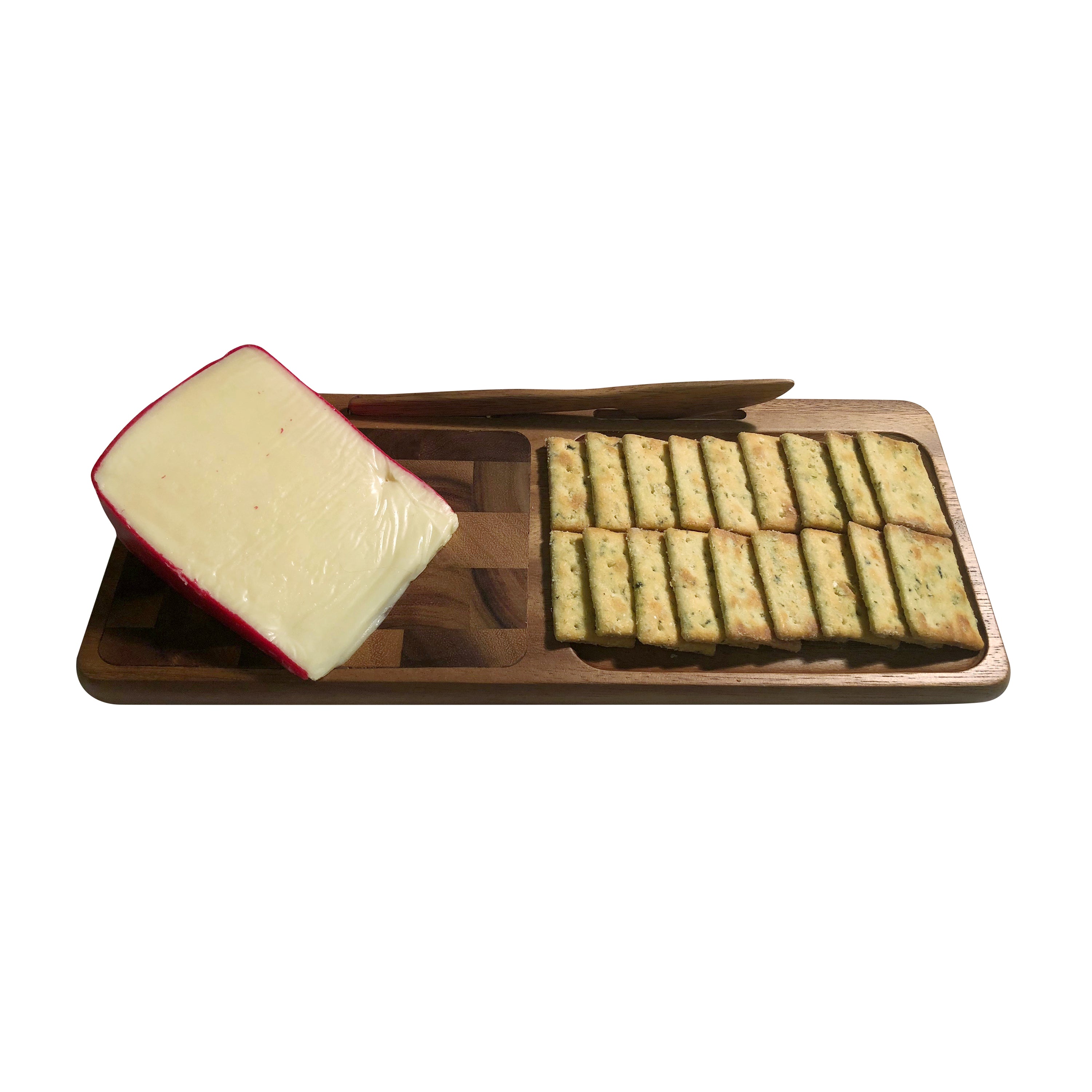 The Bornholm Cheeseboard with Knife, made from acacia wood, showcases a geometric pattern on the left and a recessed area on the right, making it an elegant choice for serving cheese.