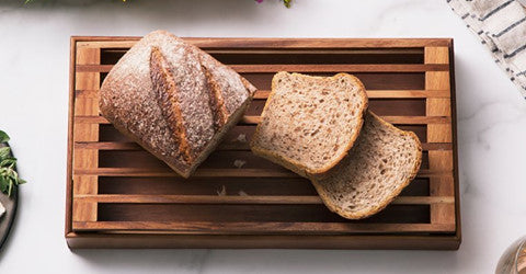 Kronberg Bread Crumb Catcher, a rectangular wooden slatted dish drainer with a smooth finish, crafted from durable Acacia wood for a touch of elegance.