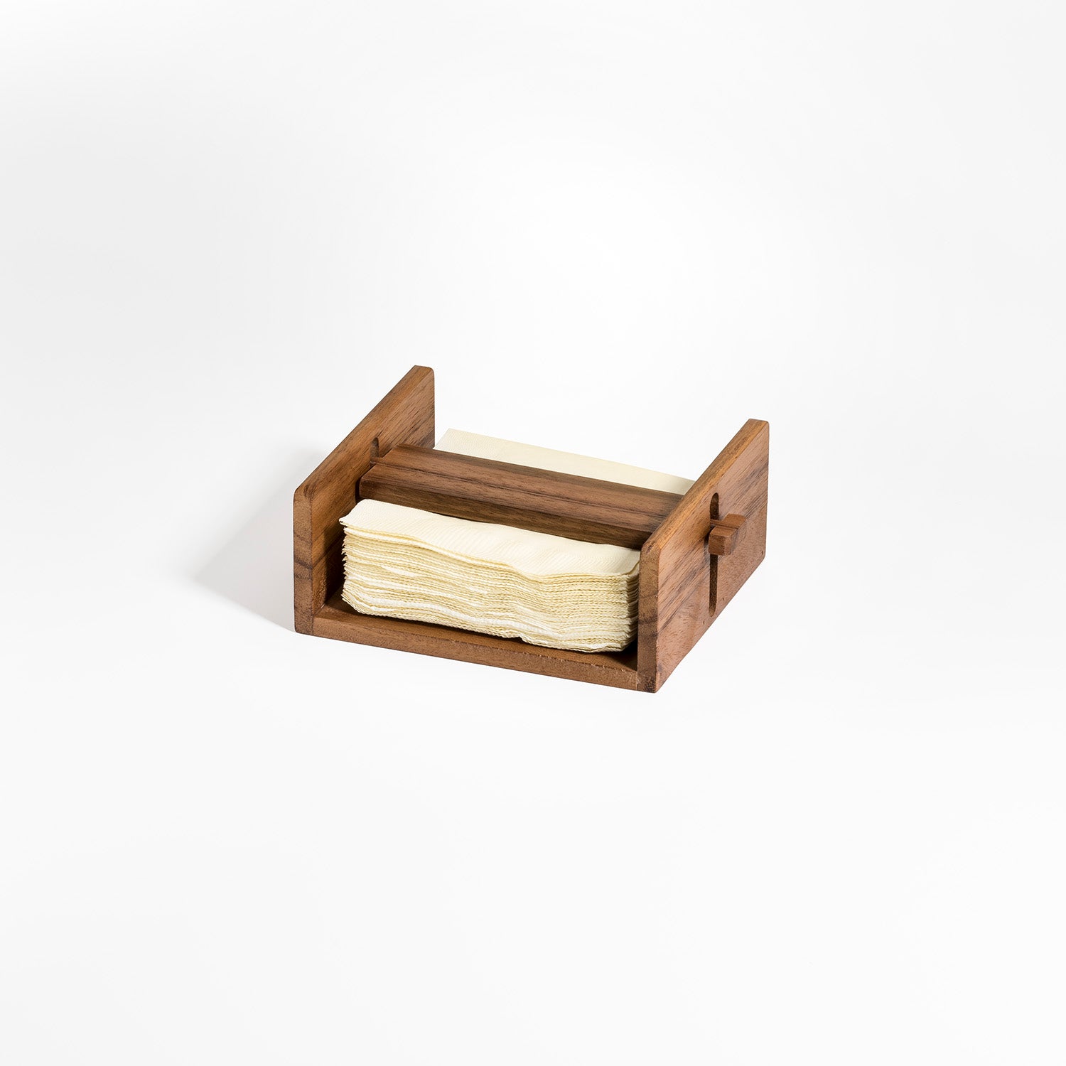 A sophisticated cocktail napkin holder, crafted from luxurious Acacia wood, is showcased against a pristine white background.