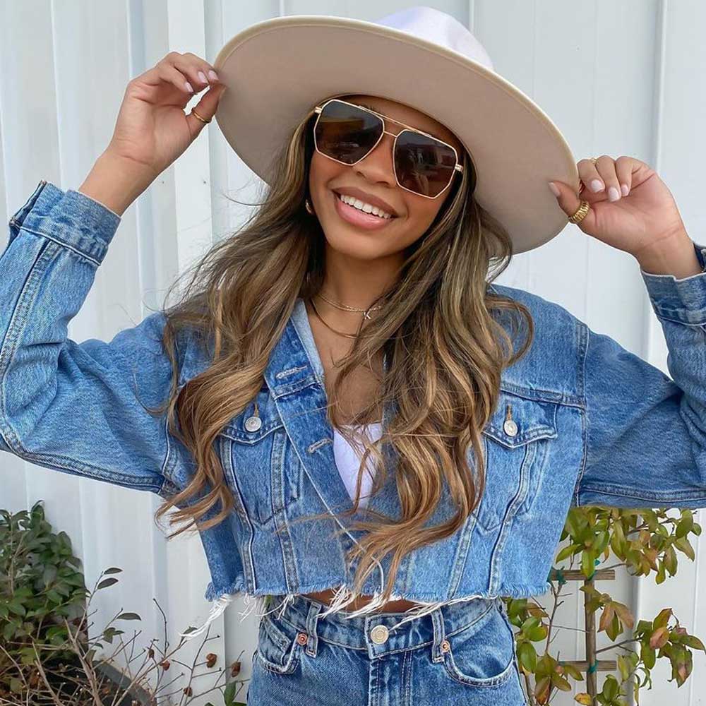 A pair of Goldie sunglasses with brown lenses.