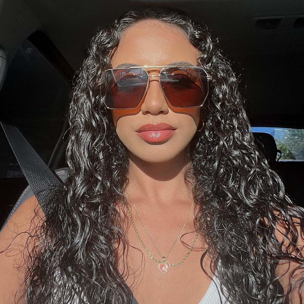 A pair of Goldie sunglasses with brown lenses.