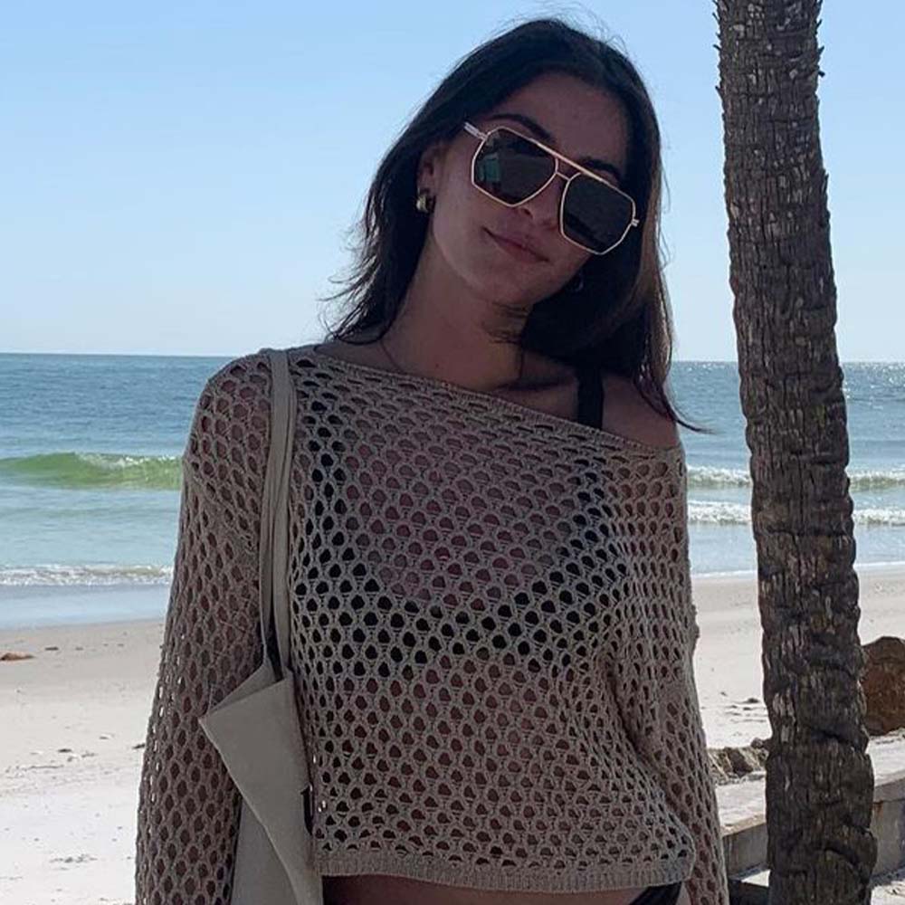 A pair of Goldie sunglasses with brown lenses.