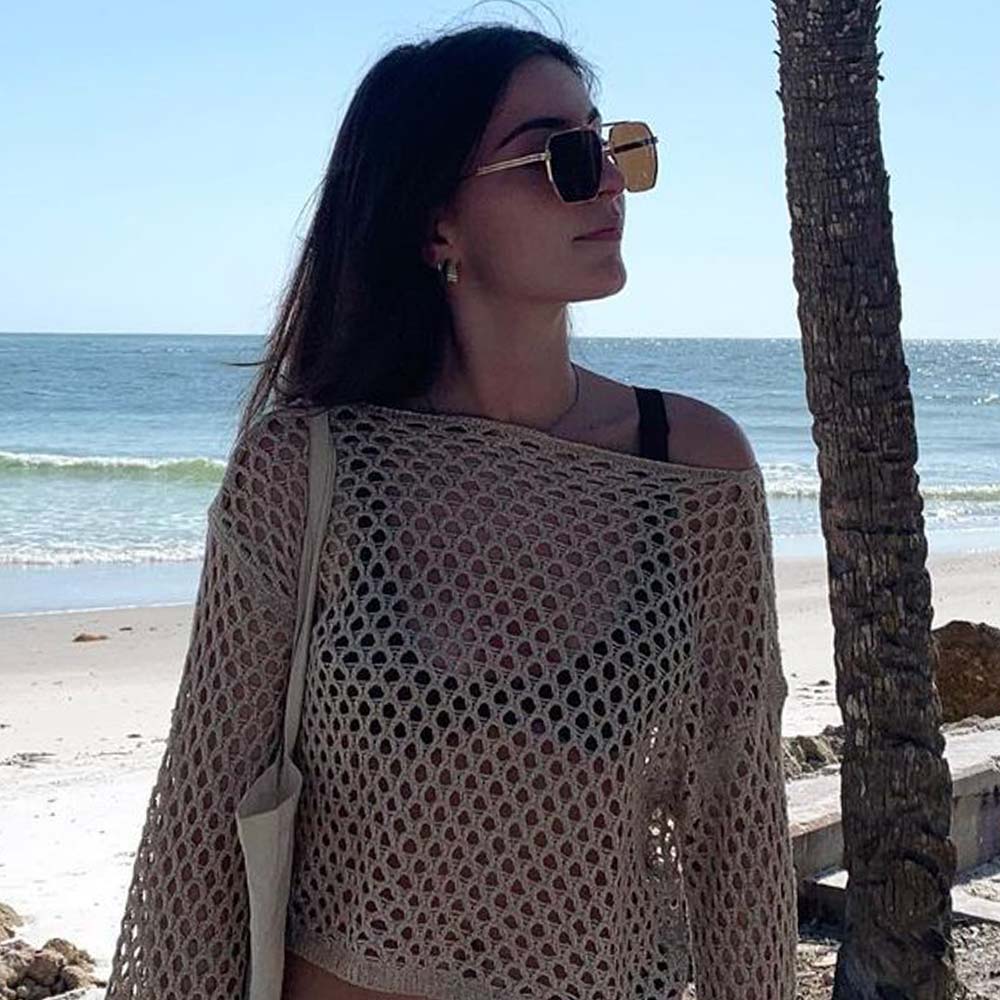 A pair of Goldie sunglasses with brown lenses.