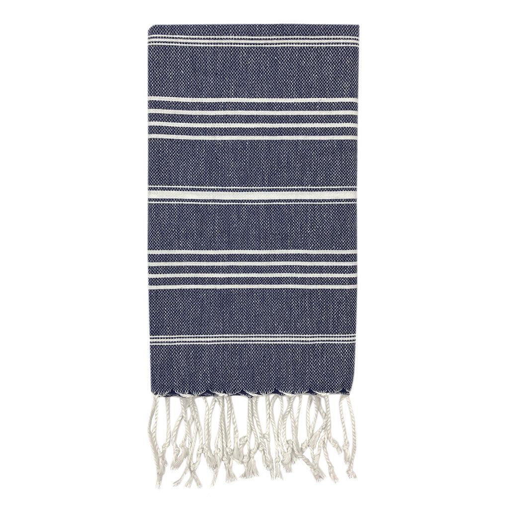 The Classic Turkish Hand Towels in five elegant striped designs, featuring shades of blue, brown, beige, navy, and grey, are beautifully displayed. Made from 100% Turkish cotton and adorned with white fringe on one end, they offer exceptional absorbency for all your needs.