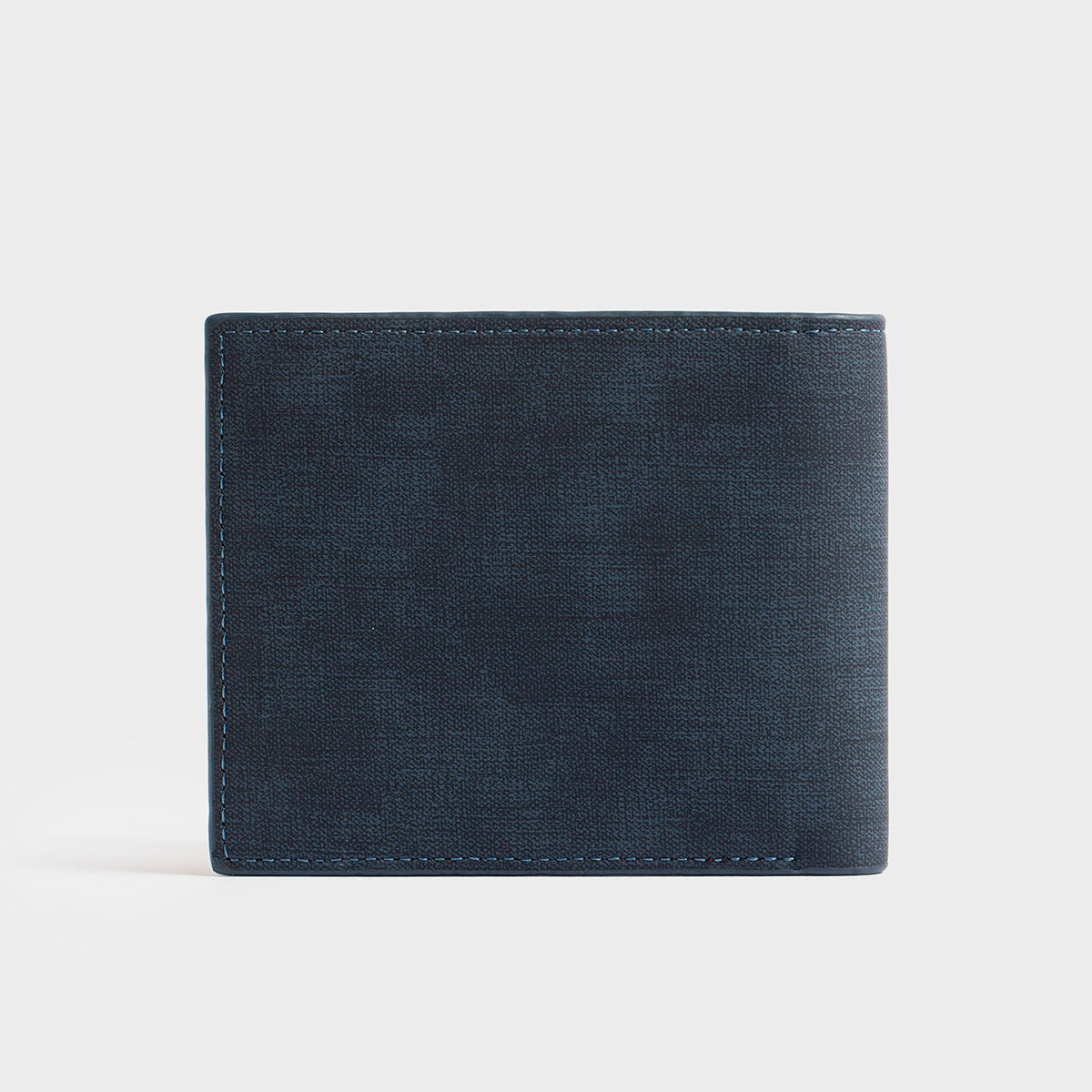 A Clifton - Casual Wallet in blue, featuring a brown patch with the "O/Z" logo on the front, along with convenient inner pockets, presented against a plain white background.