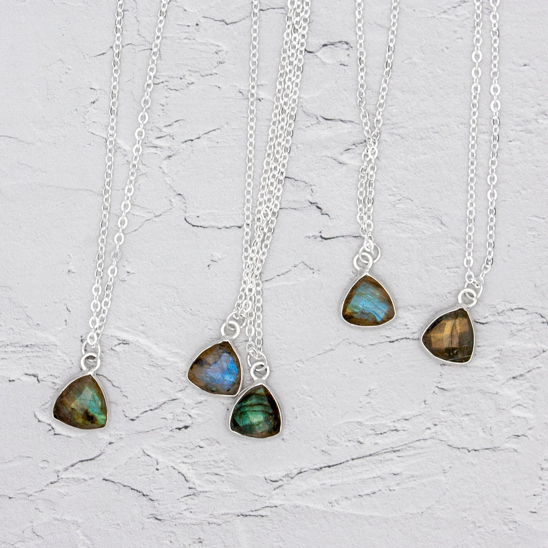 Labradorite Trillion Pendant Silver Necklace displayed against a white background.