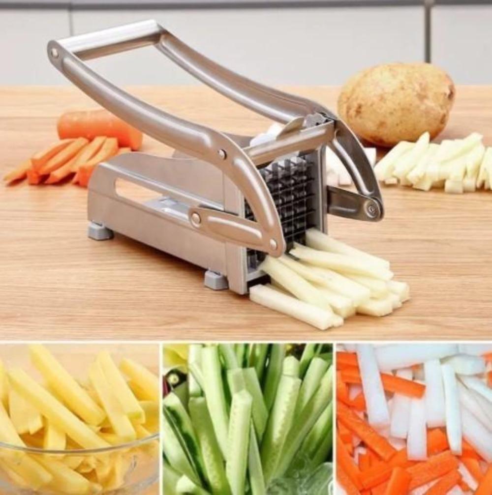 An image of a Stainless Steel French Fries and Potato Cutter with 2 Different Blades and a pile of freshly cut fries in the background.