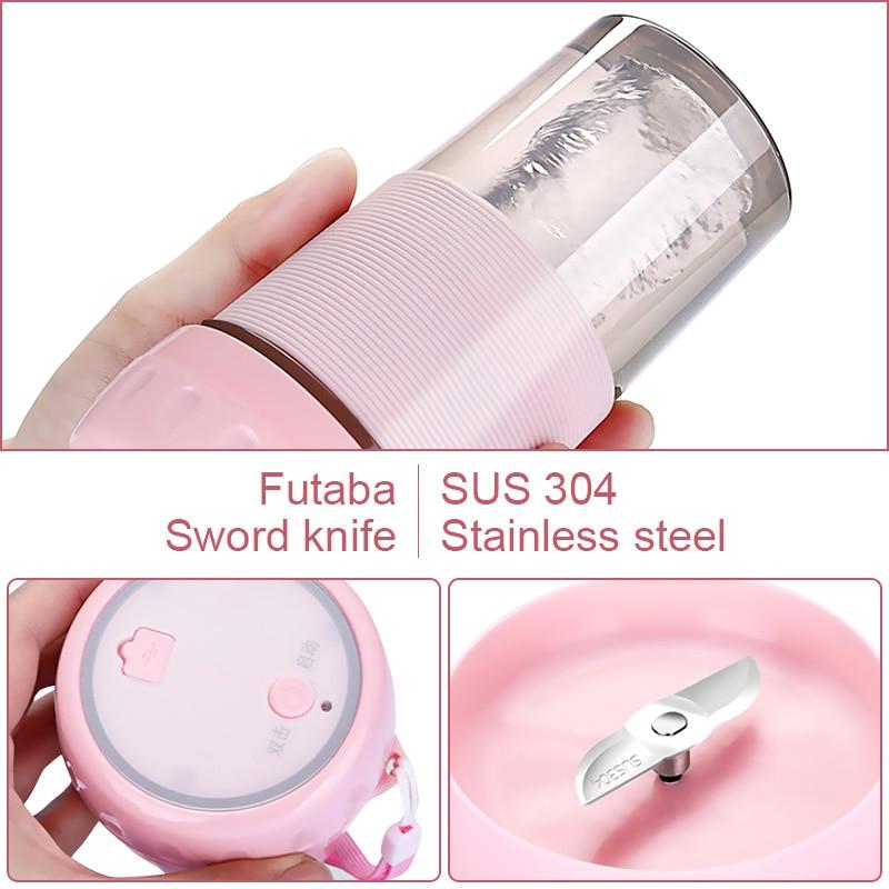 A pink and transparent Portable Personal Juice Blender and Smoothie Maker with a lid featuring a carrying strap, ribbed grip section, and translucent bottom half doubles as a personal wireless juice blender rechargeable via USB.