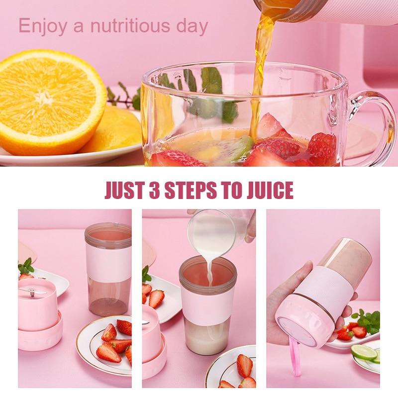 A pink and transparent Portable Personal Juice Blender and Smoothie Maker with a lid featuring a carrying strap, ribbed grip section, and translucent bottom half doubles as a personal wireless juice blender rechargeable via USB.