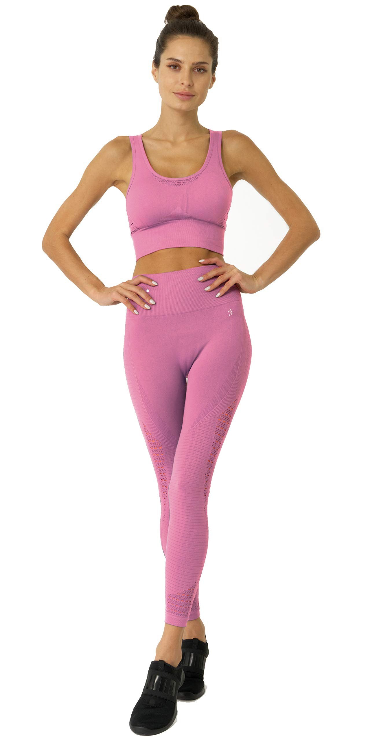 A person is wearing Mesh Seamless Leggings with ribbing detail in pink, featuring a high waistband, standing against a white background.