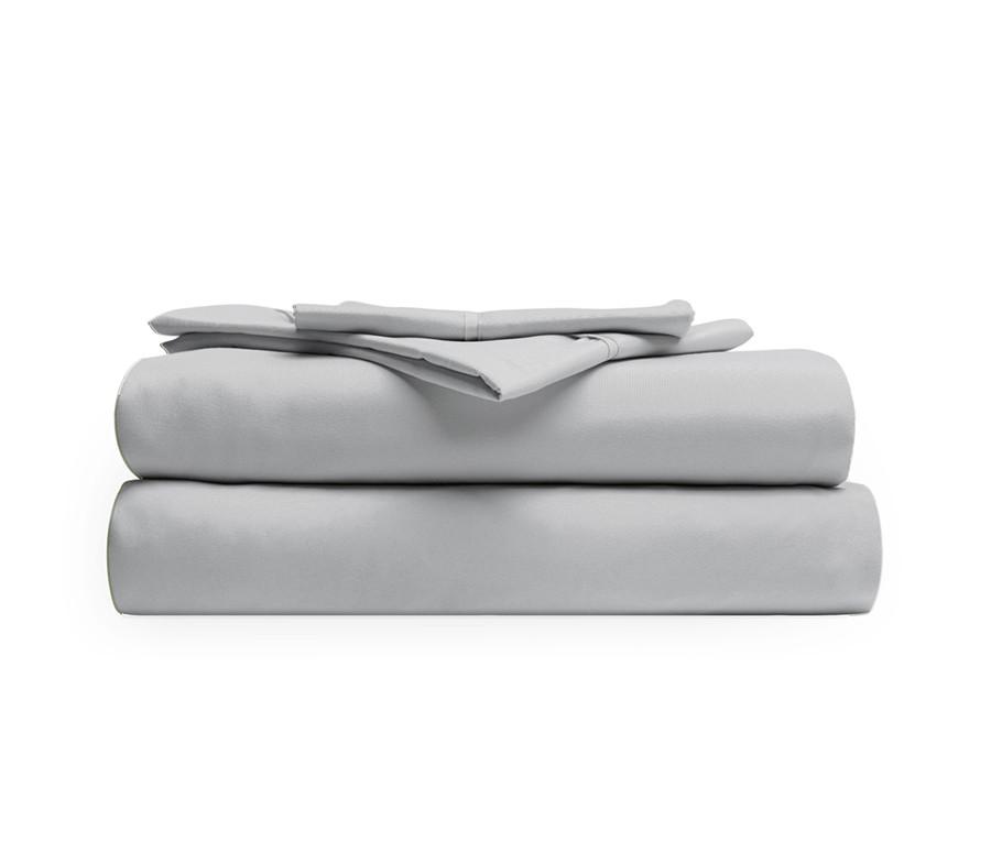 A stack of silver sheets on top of each other.