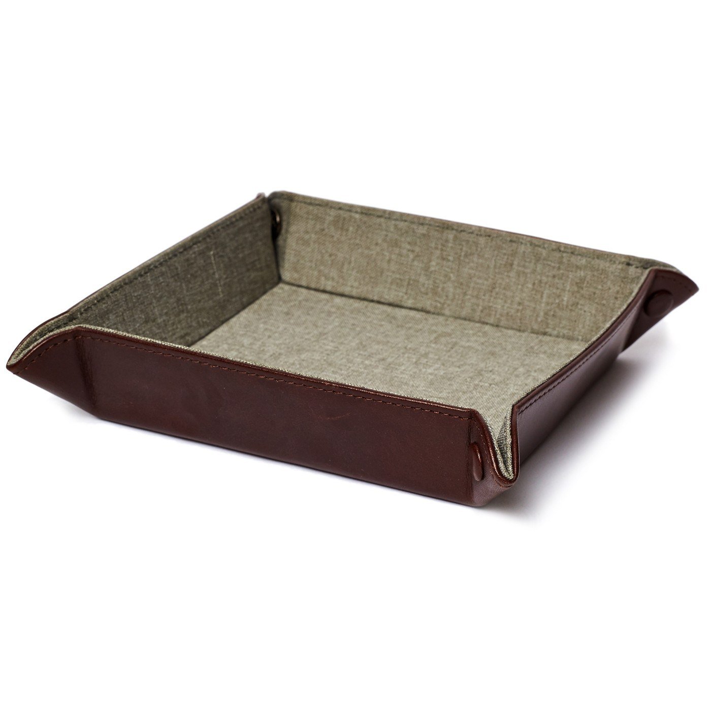 The Floyd Foldable Valet Tray is a rectangular leather organizer featuring raised sides and corner buttons, ideal for storing small items such as keys.