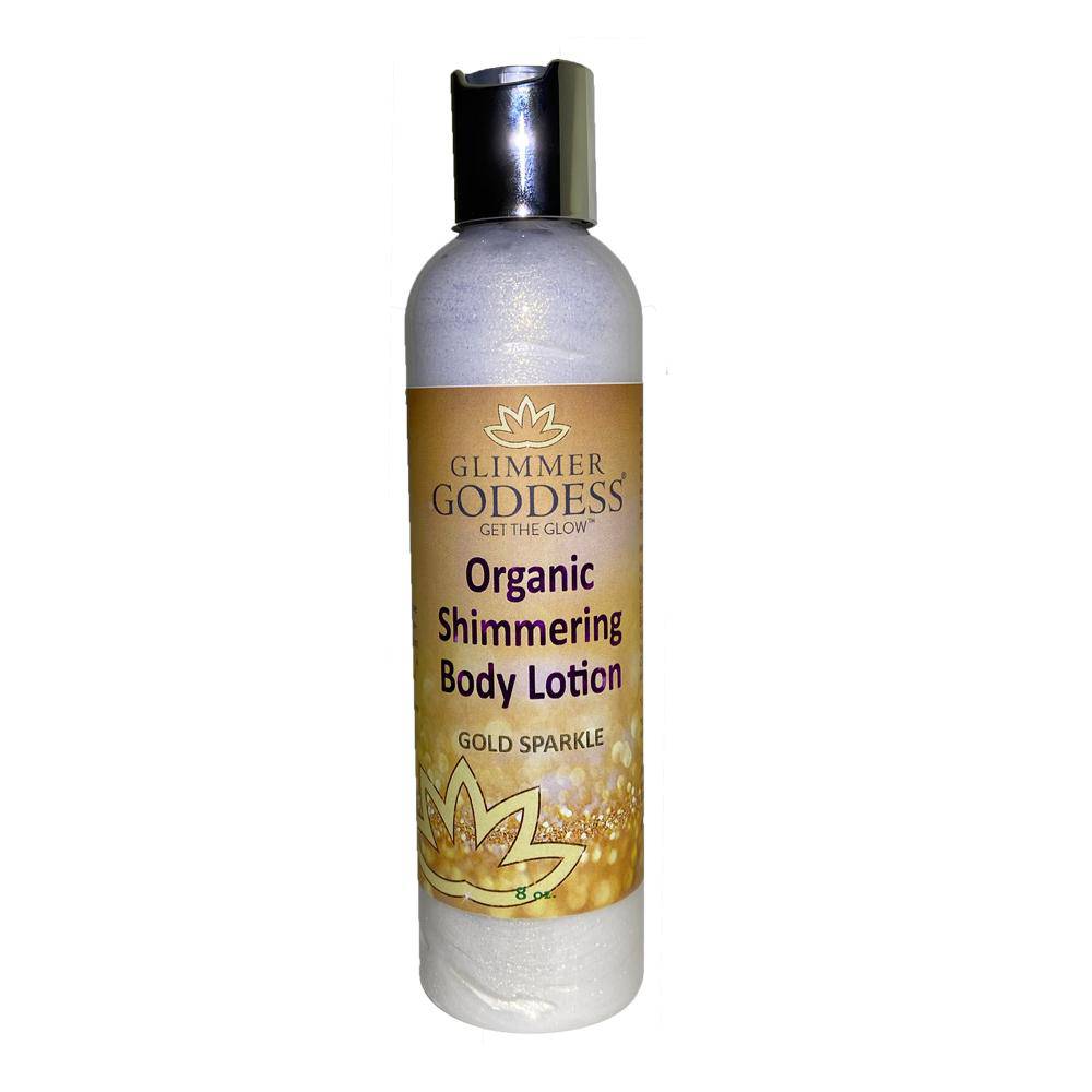 A bottle of Organic Gold Shimmer Body Lotion - Sparkle For All Skin Types to hydrate and add shimmer.