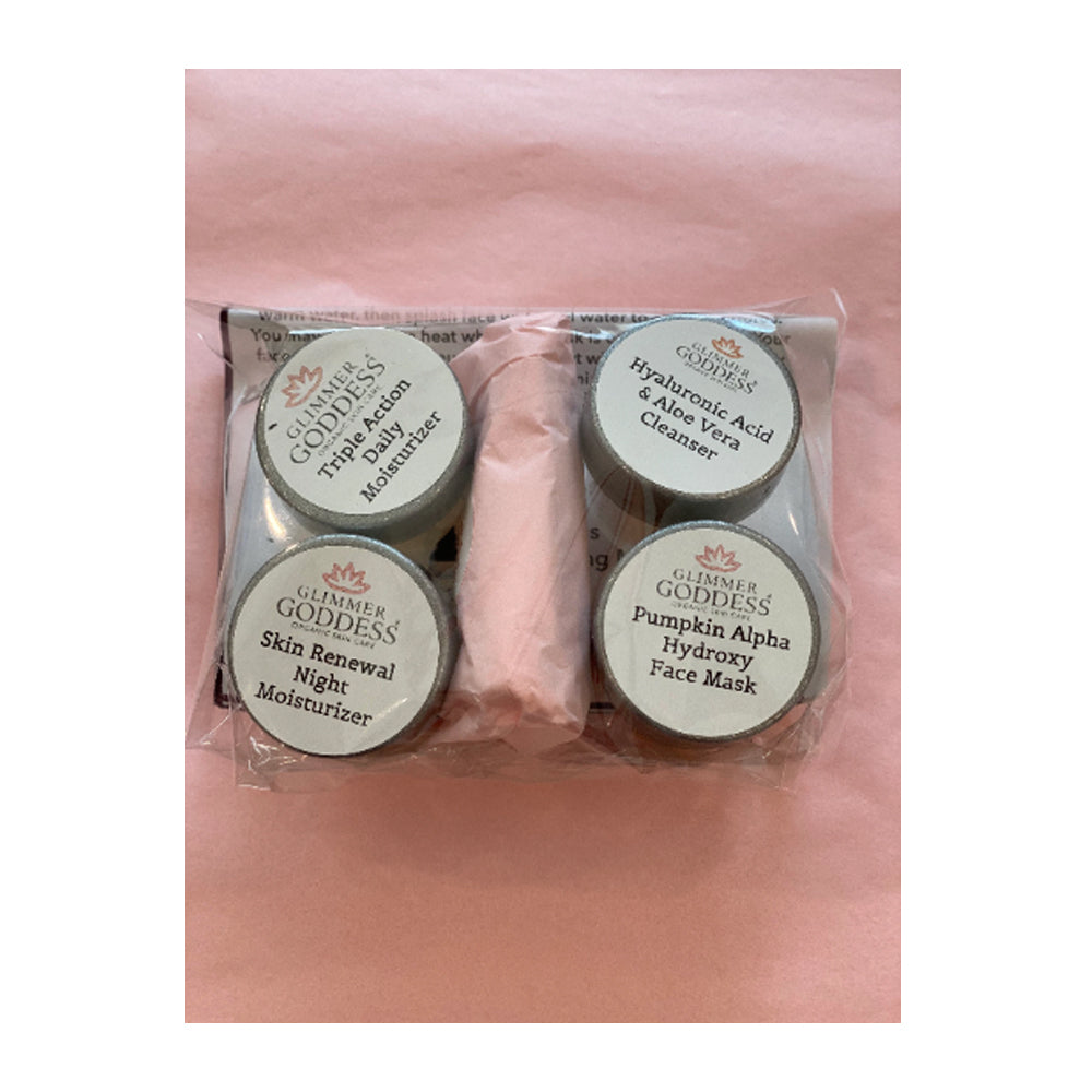 Four Organic Skin Care Trial Sets including a moisturizer, face mask, and cleansers with hyaluronic acid serum, packaged on a pink background.