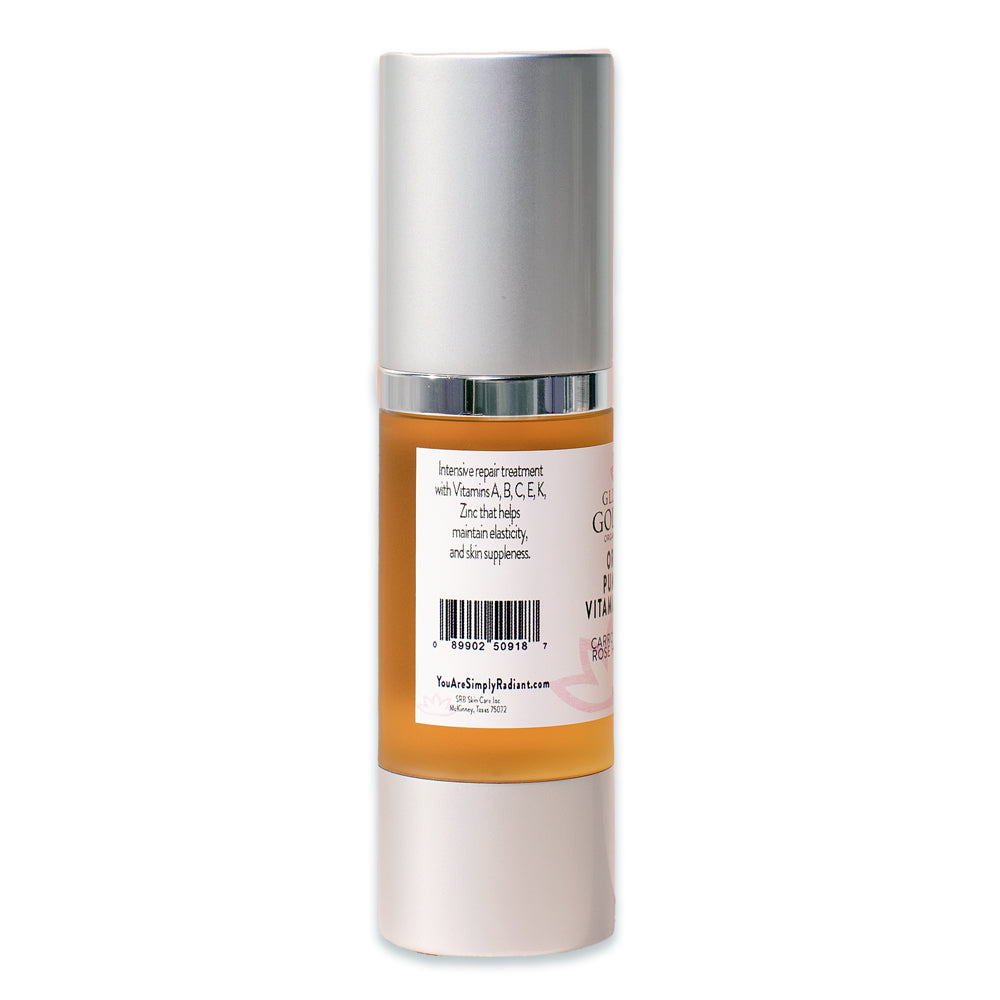 A bottle of Organic Pumpkin + Vitamin E Serum - Instant Glow Treatment with rosehip seed oil, packaged in a sleek silver dispenser.