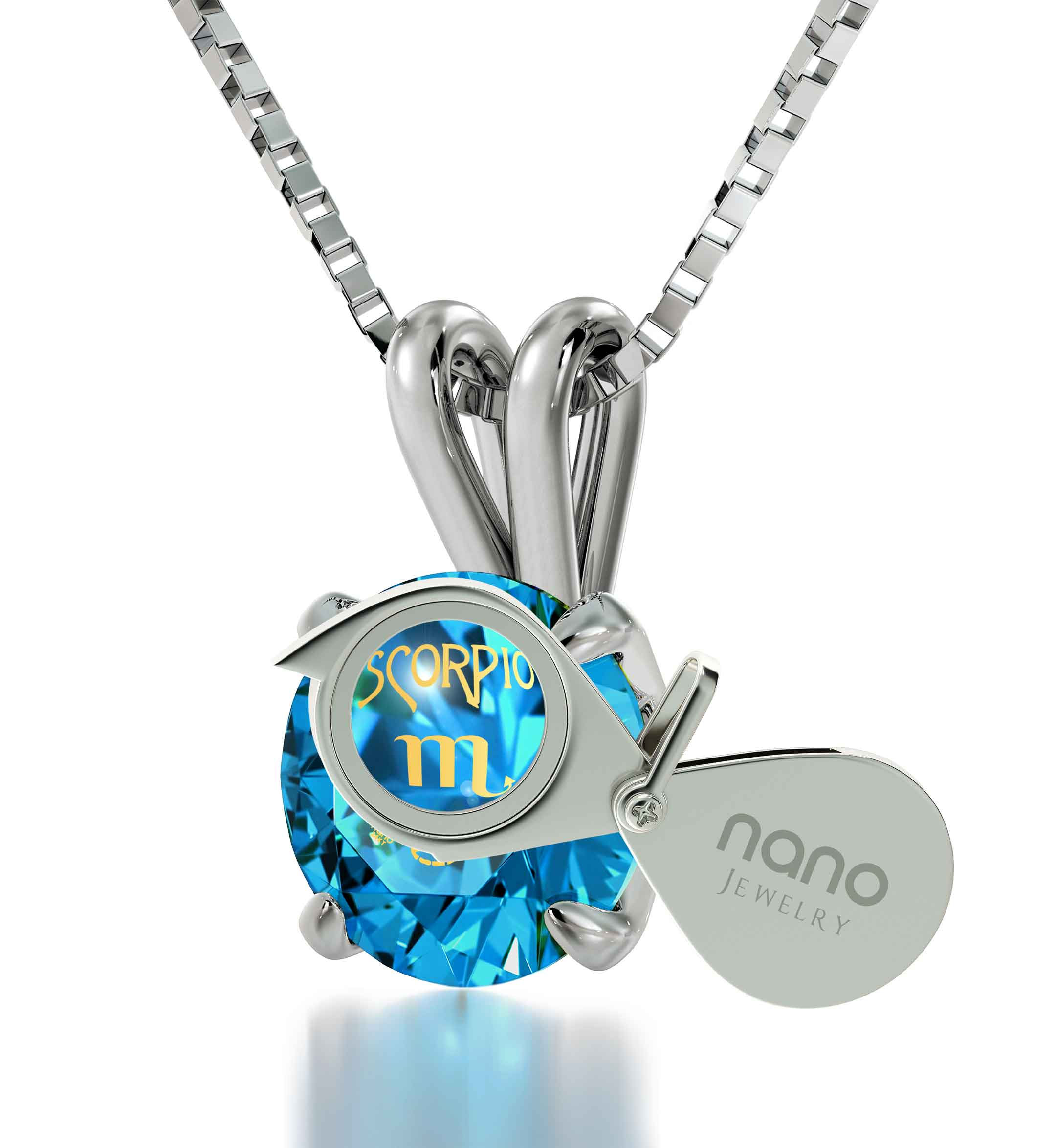 925 Sterling Silver Scorpio Necklace Zodiac Pendant with a Swarovski Crystal, attached to a sterling silver chain, featuring a small tag engraved with 'nano jewelry'.