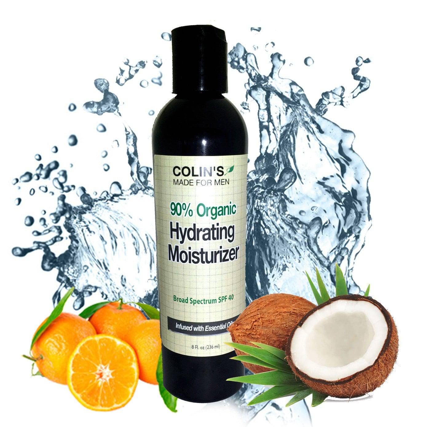 Bottle of Organic Mens Face Cream - Broad Spectrum SPF 40, surrounded by splashing water, oranges, and a coconut half.