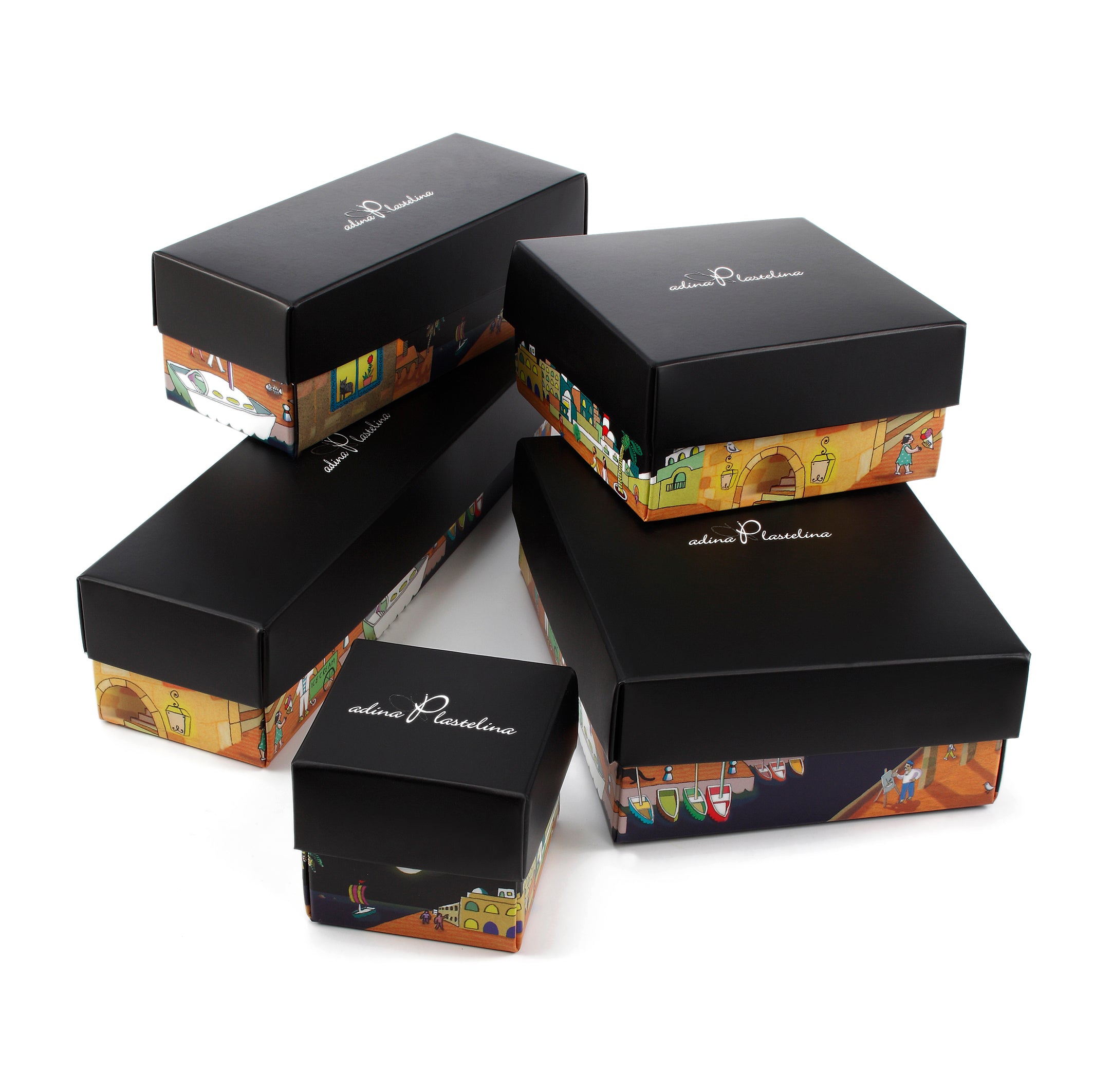 A collection of black salamander shoe boxes of various sizes, featuring colorful designs on the sides, arranged around a Gold Plated Silver Cat Necklace Pet Lovers Gift on a white background.