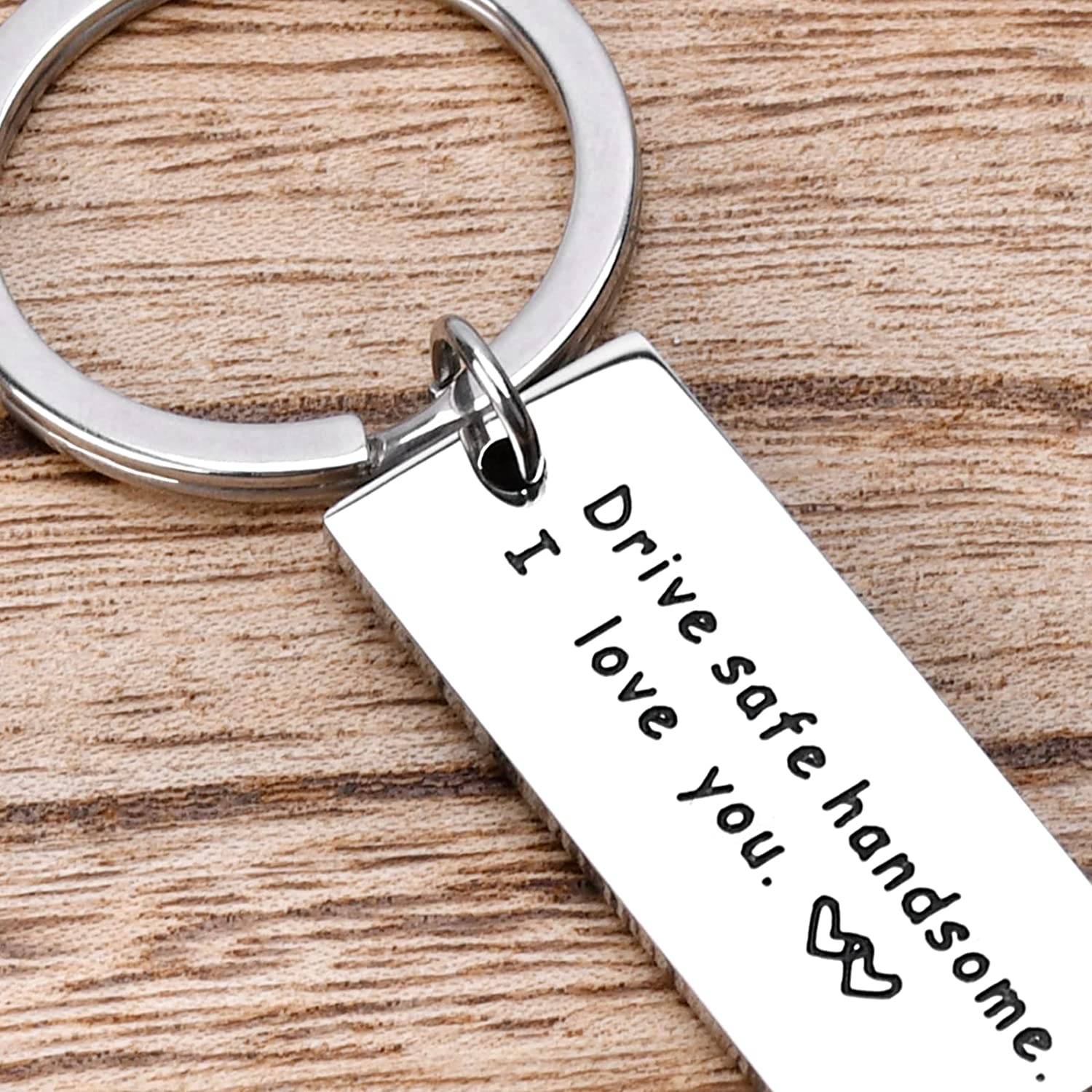 A key chain with the words "drive safe kindsome i love you" is a Valentines Day Gifts for Him Boyfriend Husband from Wife , Drive Safe Handsome Keychain Mens Valentines Gifts for Trucker Fathers Day Birthday Anniversary Christmas Gift for Men Dad by ModernMazing.