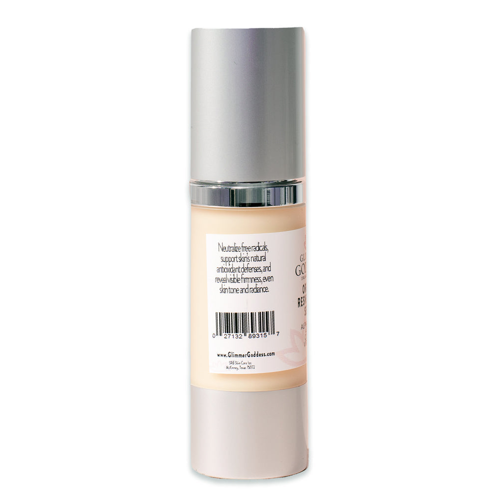 A silver cylindrical bottle of Organic Resveratrol Instant Firming Serum - Visibly Smooths Fine Lines, infused with anti-aging ingredients, with labels displaying product information.