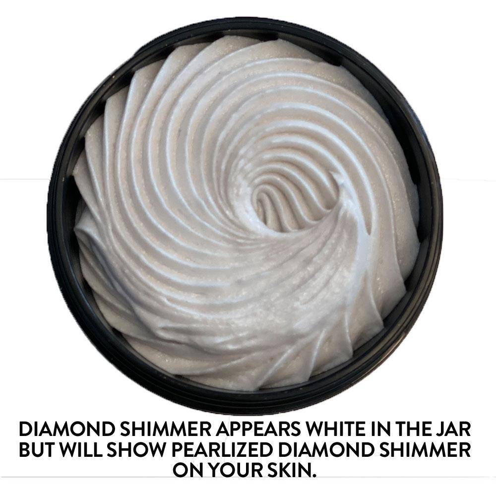 A jar of Organic Shimmering Whipped Body Butter against a white background. This moisturizing whipped body butter is perfect for nourishing the skin.