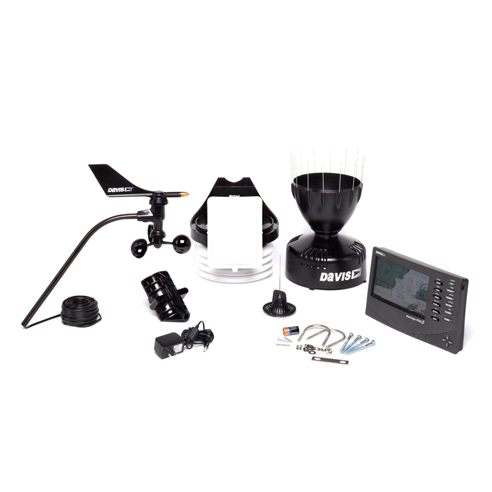 A black and white image of a Davis Vantage Pro2™ Wired Weather Station and other items.
