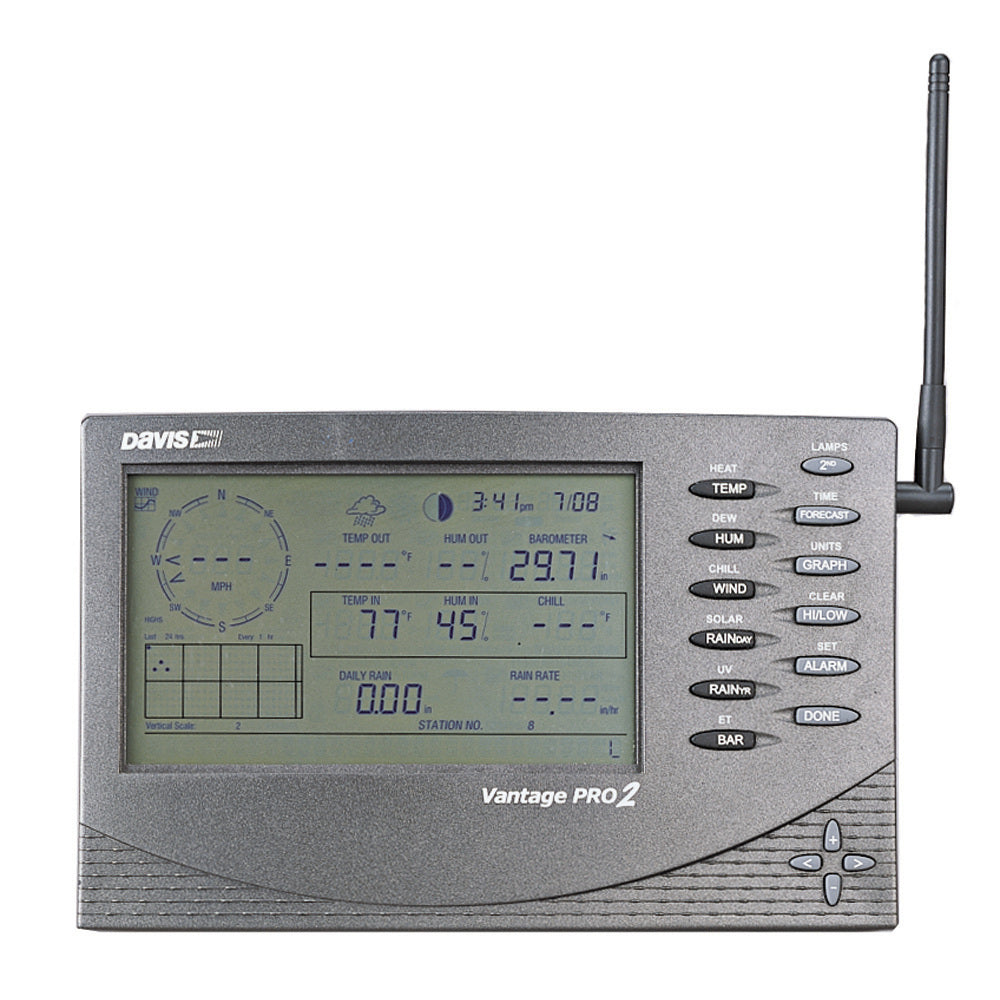 A Davis Vantage Pro2 Wireless Console-Receiver - 2nd Station with a clock and a radio.