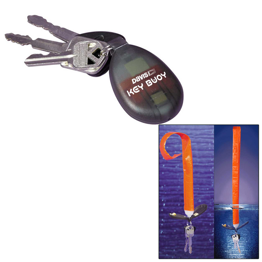 A Davis Instruments Self-Inflating Key Bouy with an orange key and a picture of a boat.