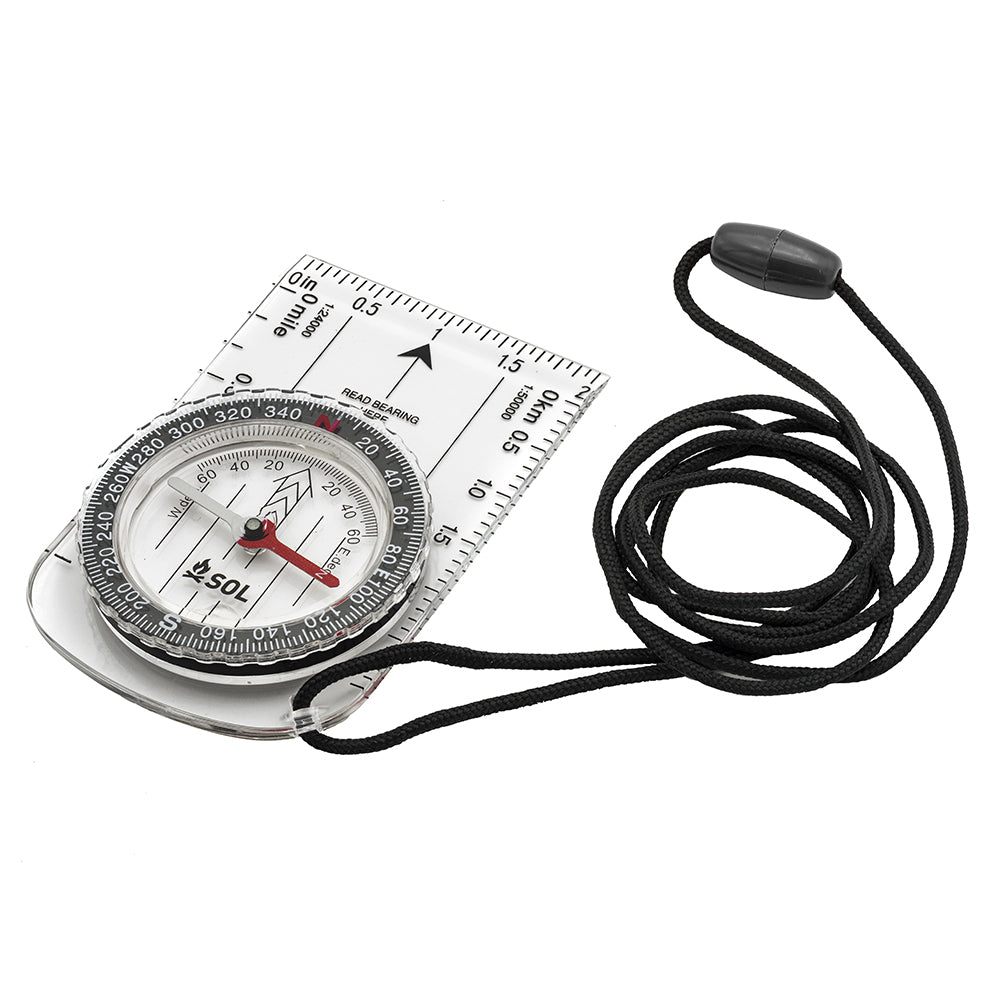 A S.O.L. Survive Outdoors Longer Map Compass with a cord attached to it.