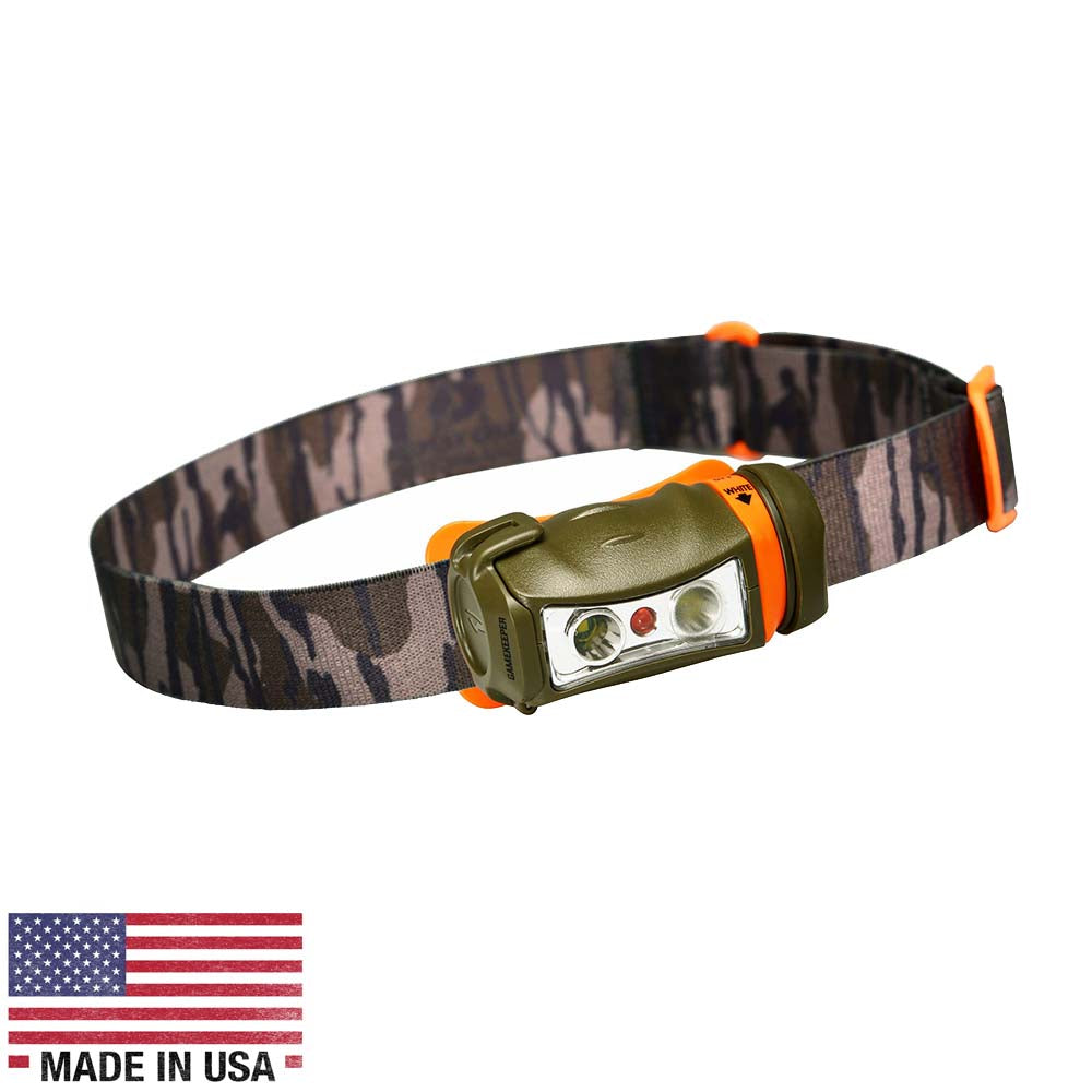 A Princeton Tec Mossy Oak Gamekeeper - SYNC Headlamp with an american flag on it.