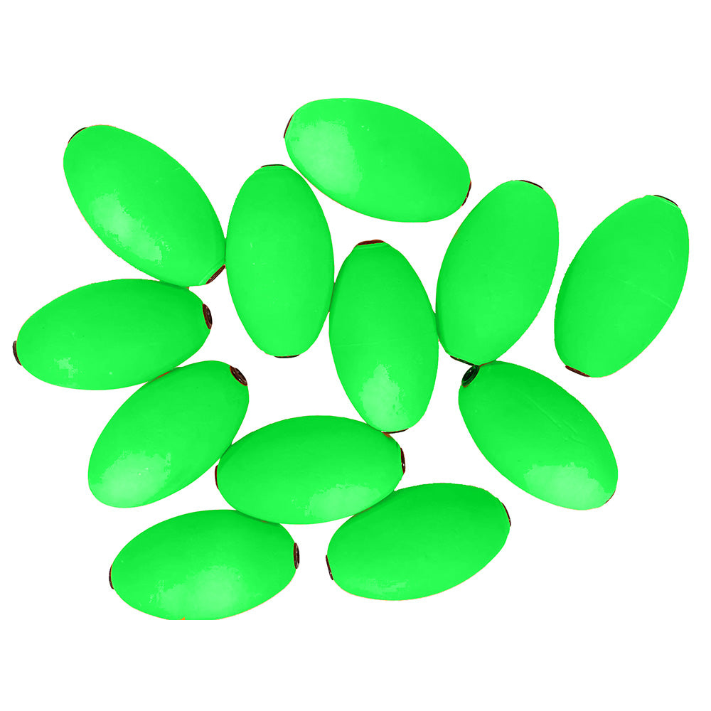 A bunch of Tigress Oval Kite Floats - Green *12-Pack beads on a white background.