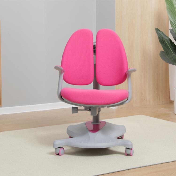 A Smiley Ergonomic Height Adjustable Kids Chair (Pink) with wheels in a room.