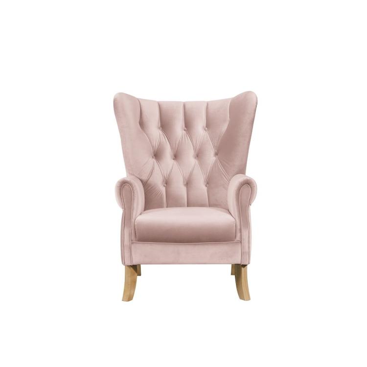 A pink Wooden Velvet Gaming Chair with wooden legs.