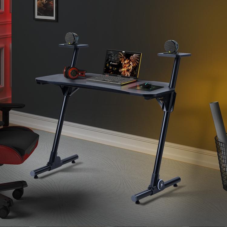 A black ModernMazing Z-Shaped Home Office Computer Gaming Desk Workstation with Carbon Fiber Surface and two legs.
