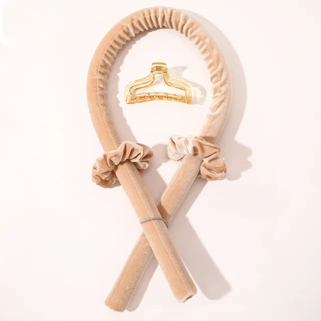 A woman's hair with salon-quality curls and the Velvet Dream Heatless Hair Curler tiara.