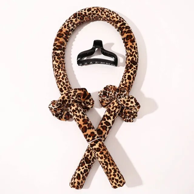 A woman's hair with salon-quality curls and the Velvet Dream Heatless Hair Curler tiara.