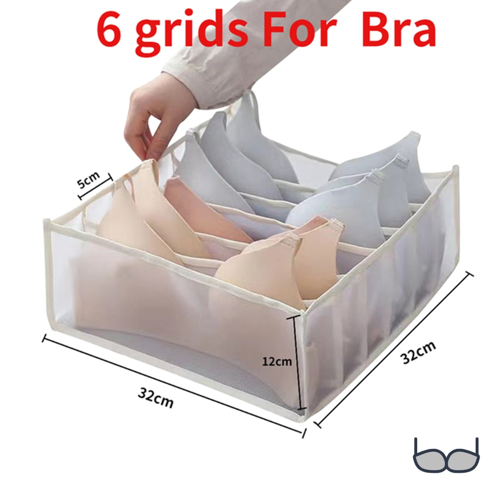 A woman is putting clothes in a ModernMazing Wardrobe Clothes Organizer.