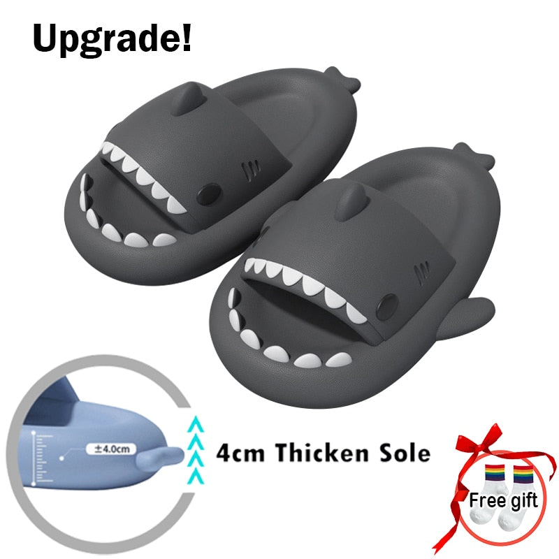 A pair of ModernMazing Premium Shark Slides - Super Soft, Comfy, Silent, & Anti-Slippery on a beach with palm trees.