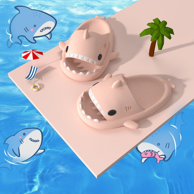 A pair of ModernMazing Premium Shark Slides - Super Soft, Comfy, Silent, & Anti-Slippery on a beach with palm trees.