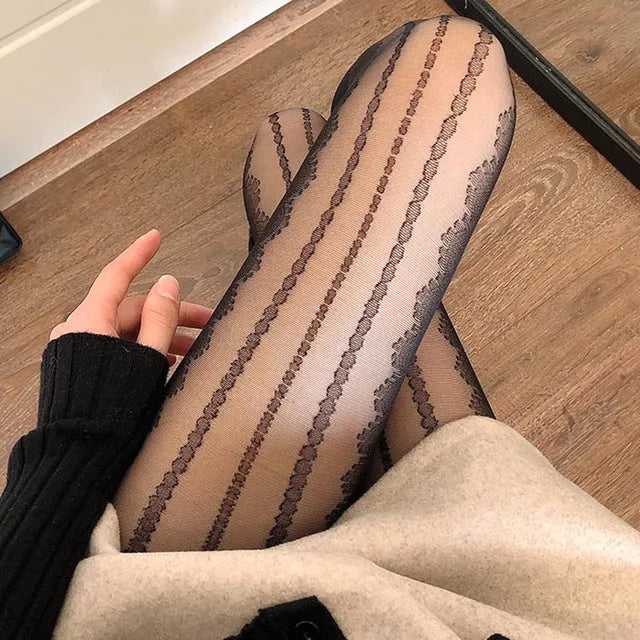 A woman with Lolita Elegance: Goth-Style Lace Stockings.