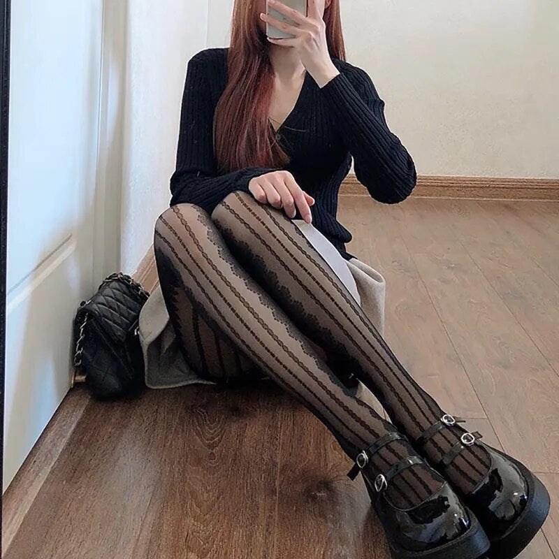 A woman with Lolita Elegance: Goth-Style Lace Stockings.