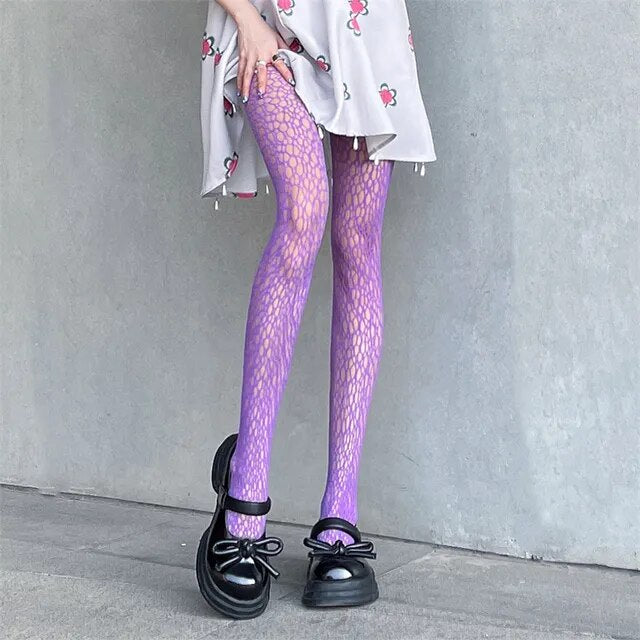 A sensuous woman wearing Seductive Silhouette Faux Thigh High Stockings and black shoes.