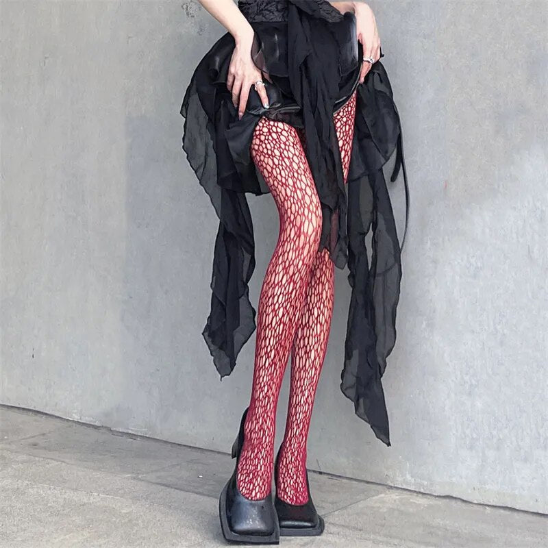 A sensuous woman wearing Seductive Silhouette Faux Thigh High Stockings and black shoes.