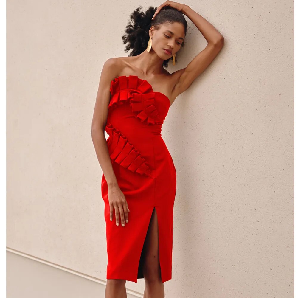 A woman wearing the Sultry Elegance: One-Shoulder Midi Bandage Dress with ruffled slits eligible for Returns and Money Back Guarantee.