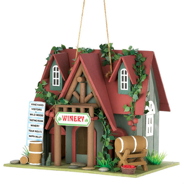 A Songbird Valley Cottage Winery Birdhouse with a winery sign on it.